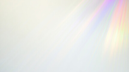 Colorful light beams on white background created by a prism effect