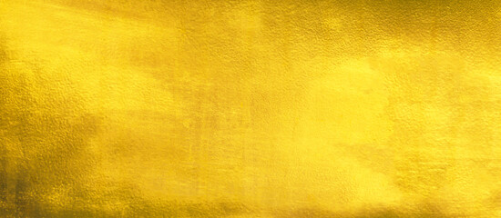 Fototapeta premium Shiny yellow leaf gold foil texture