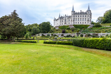 Dunrobin Castle, fairy-tale gem overlooking North Sea, offers breathtaking gardens, exquisite summer blooms. A masterpiece of elegance, lush landscapes meet historic charm, unfold on manicured lawns