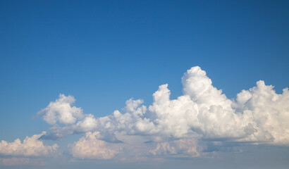 Beautiful Cumulus Clouds with Sunlight Reflections
