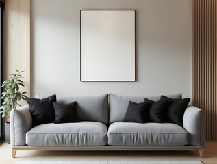 Fototapeta premium Japanese style home interior design of modern living room. Grey sofa with black cushions against wall with poster frame. 