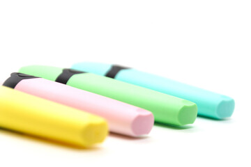 Four text markers are on a white background