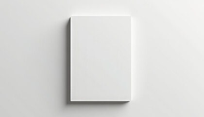 Naklejka premium Blank white book cover mockup with copy space on minimal background