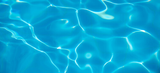 sun glare in the water, water abstract background, clear blue water