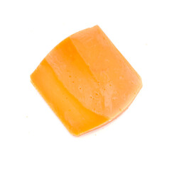 piece of cheddar cheese on white background