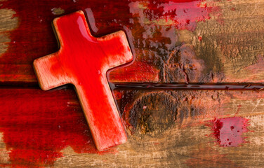 wooden holy cross with blood