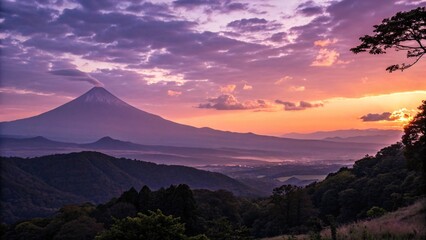 Naklejka premium Majestic mountain peak silhouetted against a breathtaking sunset, vibrant hues painting the sky with fiery orange and calming purple shades. A serene landscape.