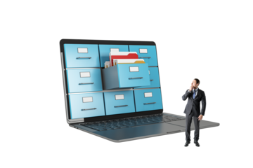 Businessman in suit standing near a laptop with file cabinet drawers on screen, symbolizing digital data storage and management, on a white background