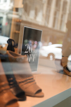 Shoe sale through shop window