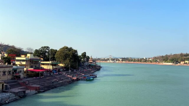 Rishikesh, Uttarakhand, India View of Ganga river embankment, Lakshman Jhula bridge and Tera Manzil Temple, Trimbakeshwar in Rishikesh
