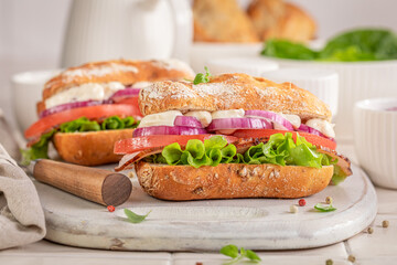Freshly made chicken sandwiches with crisp onions and creamy mayo.