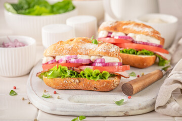 Savory and delicious chicken, tomato, and lettuce sandwich.