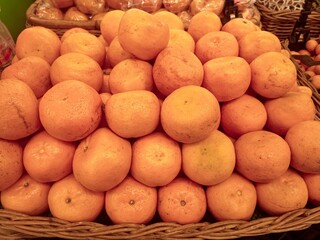 Closeup of a large and fresh orange fruit