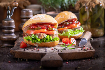 A homemade sandwich made with pate, gherkins, and tangy ketchup.
