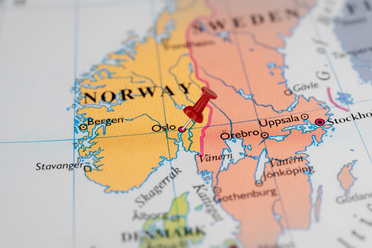 Colorful tourist location map with red stick pin at  Oslo, Norway, and the surrounding countries