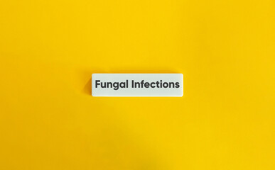 Fungal Infections Banner. Text on Block Letter Tile on Yellow Background. Minimal Aesthetic.
