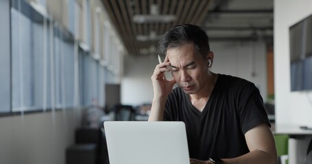 Asian businessman burn out on failed job in office. Elderly office worker expresses emotions Failed to work No success. Financial Communication Business problem. Working too hard overtime