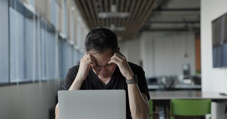 Asian businessman burn out on failed job in office. Elderly office worker expresses emotions Failed to work No success. Financial Communication Business problem. Working too hard overtime