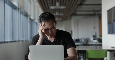 Asian businessman burn out on failed job in office. Elderly office worker expresses emotions Failed to work No success. Financial Communication Business problem. Working too hard overtime