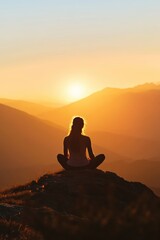 Serene figure meditating on mountain top at sunrise, symbolizing inner peace and clarity