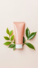 Realistic Skincare Tube Display Charming pink tube of face cleanser surrounded by green leaves creating a fresh aesthetic for natural beauty products
