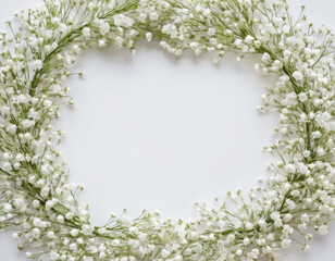Naklejka premium Abstract floral frame background. White gentle Gypsophila flowers for product presentation, greeting, invitation cards