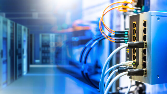 Industrial internet equipment. Server room. Network switch with fiber optic wires. Supply of server equipment with internet. Fragment of router for connecting enterprise to internet