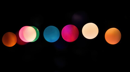 Minimal abstract bokeh with soft pink, orange, red, green, and blue orbs on deep black. Balanced scattered composition, dreamy blurred glow, warm highlights, and festive elegance for holiday decor