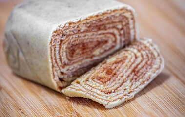 Traditional roll cake also known as Swiss roll, filled with guava paste, a typical cake from...