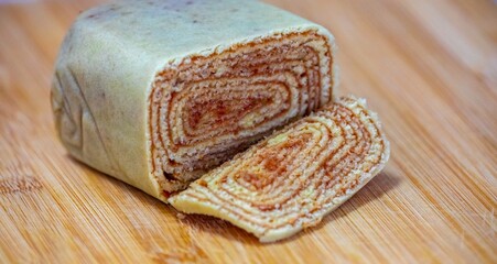 Traditional roll cake also known as Swiss roll, filled with guava paste, a typical cake from...