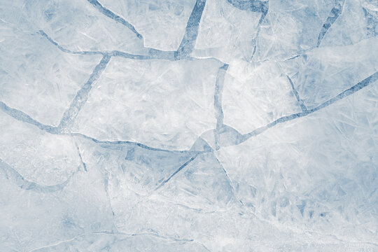 Crushed ice background texture in a cold tone. Ice shards spreading away.