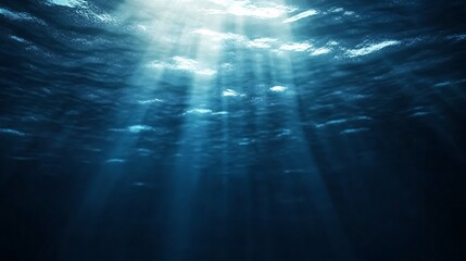 Obraz premium Serene underwater scene, tranquil blue water with sun rays penetrating, evokes calmness, ideal for relaxation themes.