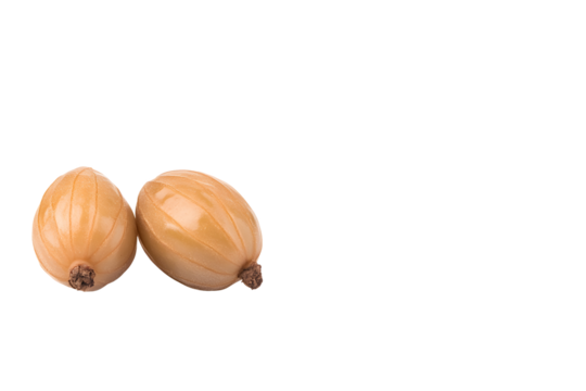 Two gooseberries, light amber color, smooth surface with longitudinal lines, brown stem ends. Isolated against black.