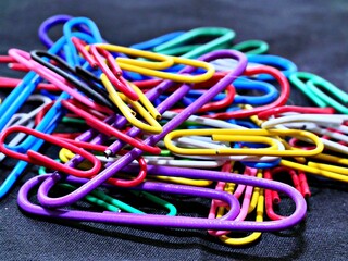 A stack of colored paper clips