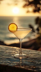 lemon drop cocktail in a glass at a bar on the beach