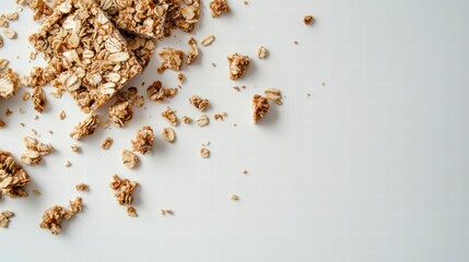 Granola Bar Crumbs: The close-up shot captures the texture and detail of a broken granola bar, with scattered crumbs. A healthy snack option.