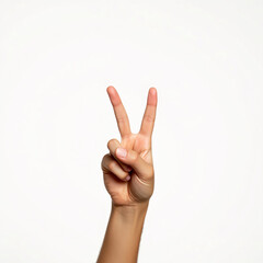 Hand making a peace sign gesture, symbolizing peace or victory in a simple, clear expression.