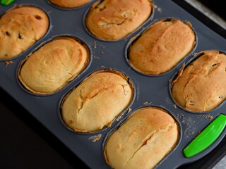 Freshly baked gluten-free buns in a silicone mold