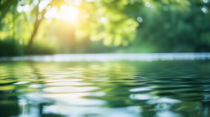 Abstract blurred background of nature with green trees and water reflection.