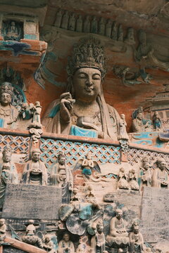 Dazu：A series of Chinese religious sculptures and carvings and UNESCO World Heritage Site located in Dazu District, Chongqing, China. The carvings date back as far as the 7th century AD