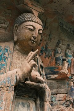 Dazu：A series of Chinese religious sculptures and carvings and UNESCO World Heritage Site located in Dazu District, Chongqing, China. The carvings date back as far as the 7th century AD