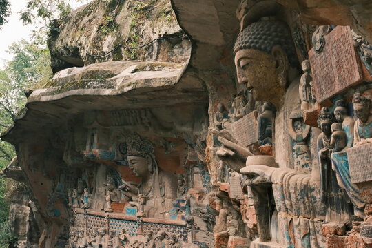 Dazu：A series of Chinese religious sculptures and carvings and UNESCO World Heritage Site located in Dazu District, Chongqing, China. The carvings date back as far as the 7th century AD