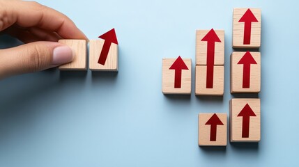 Arranging blocks with arrows indicating growth on a blue surface, indicating upward trend