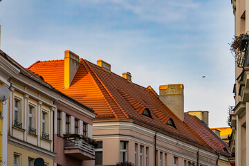 old urban architecture at sunset. blocks and residential buildings in the city against the...