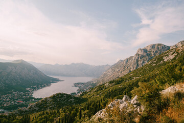 View from the mountain to the Bay of Kotor, surrounded by a mountain range. Montenegro