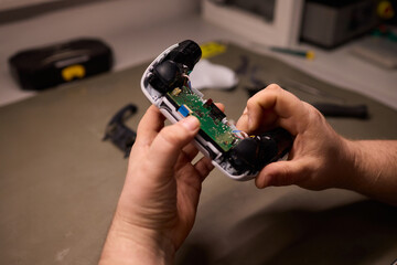 Handsome Experience with Repairing a Game Controller Using Various Tools and Techniques