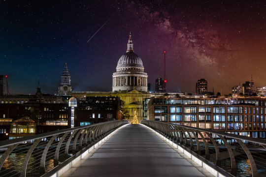 Millennium Bridge across the River Thames leading to St Paul's Cathedral at night, City of London, London, England, UK