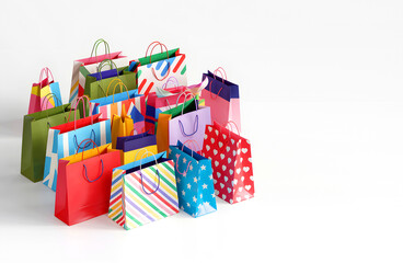 "Vibrant Colorful Shopping Bags Arranged on a Clean White Background, Featuring Various Sizes and Bright Hues for Retail and Gift Packaging"