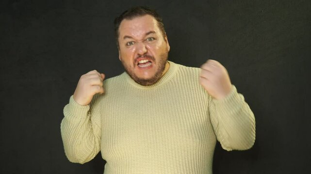 Adult man swearing and shouting. Stress and problems.