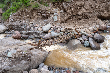 Old bridge crossing the river in Colca Canyon, Peru